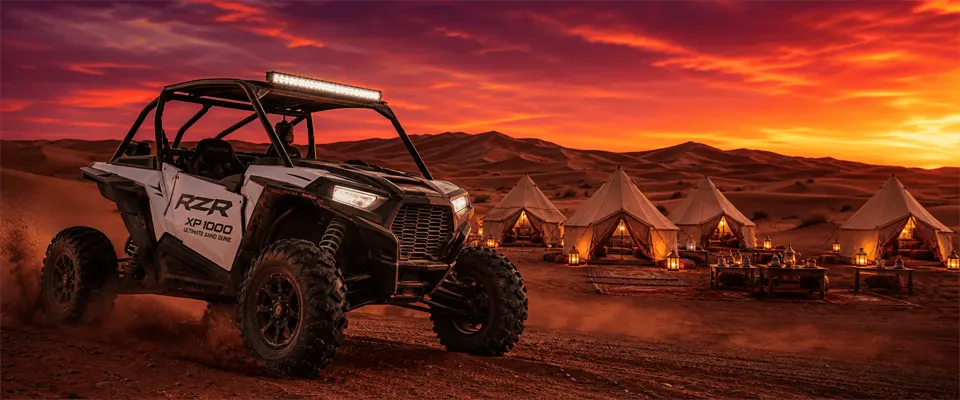 Polaris RZR dune buggy at sunset on a premium desert safari combo near Dubai